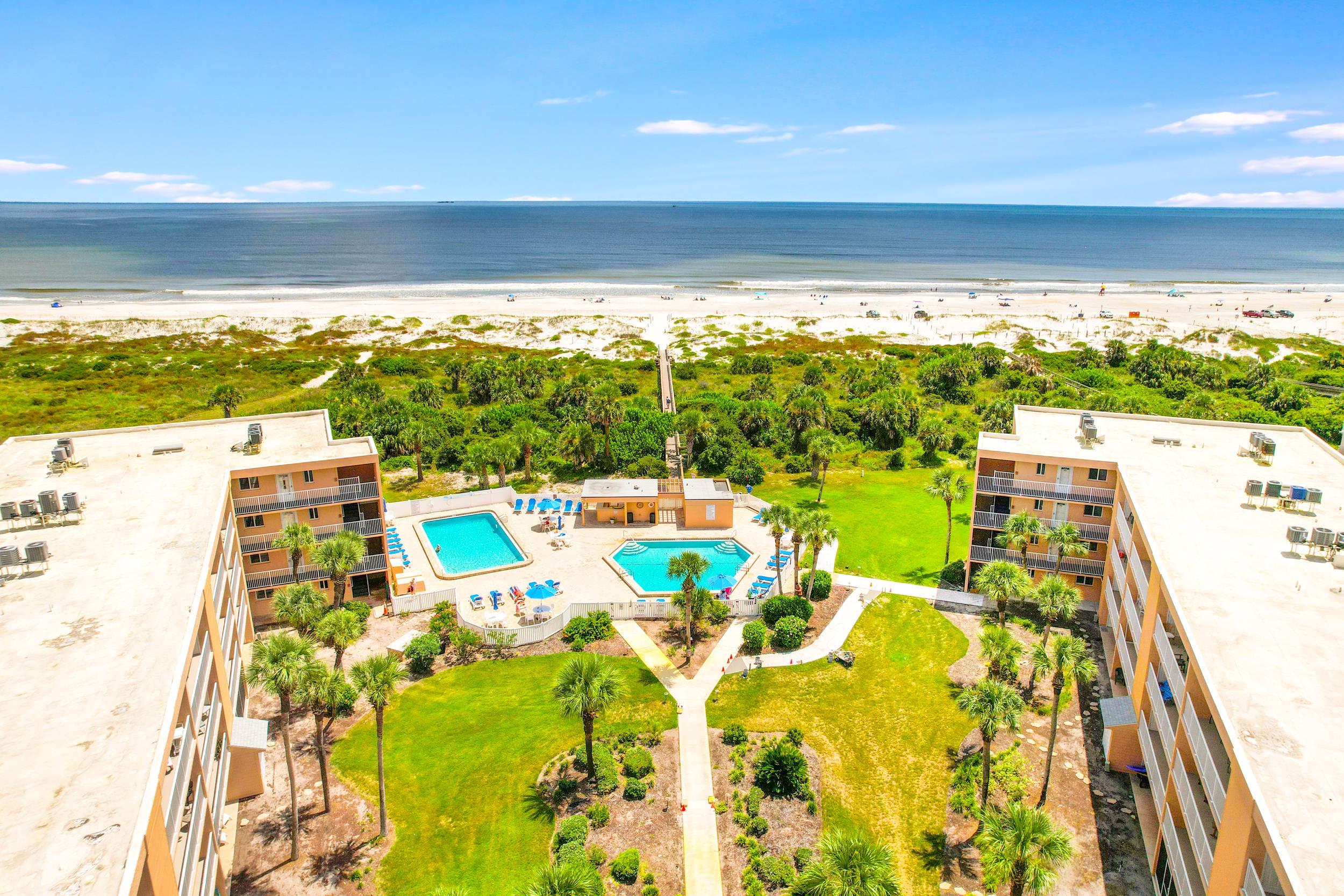a view of swimming pool with an ocean view