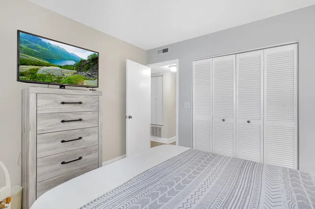 a view of a livingroom with wooden floor