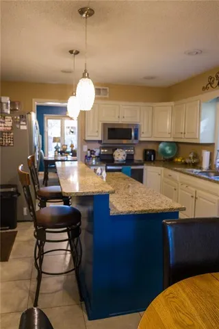 $364,900 | 1513 Northwest Weatherstone Court, Blue Springs, MO 64015