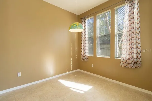 a view of a room with a large window