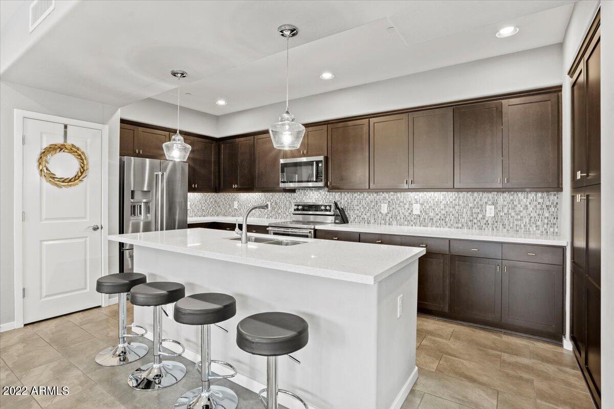 3935 East Rough Rider Road, Unit 1294 Phoenix, AZ 85050 - Photo 9 of 48 Kitchen
