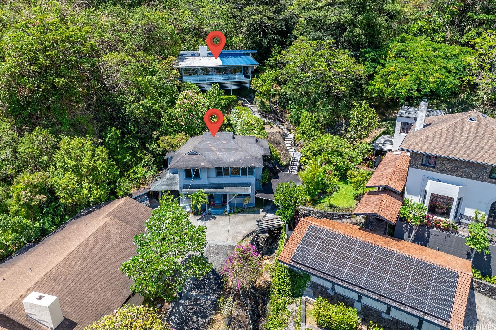 a view of a patio with table and chairs and potted plants