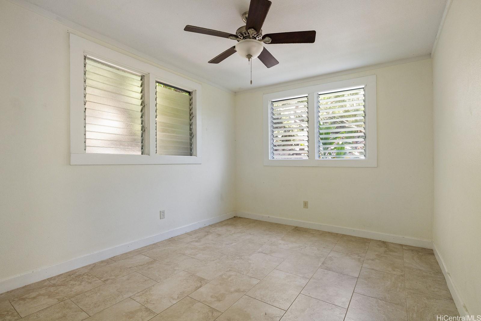 2870 Komaia Place, Unit 2870A AND 2884 Honolulu, HI 96822 - Photo 16 of 25 a view of an empty room with a window