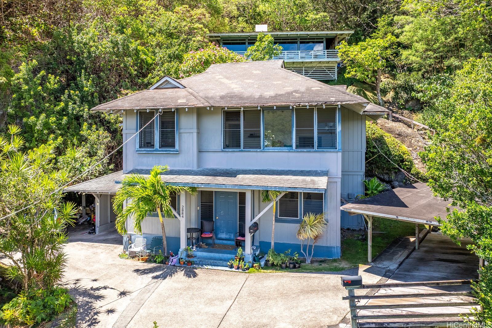 2870 Komaia Place, Unit 2870A AND 2884 Honolulu, HI 96822 - Photo 2 of 25 a front view of a house with garden