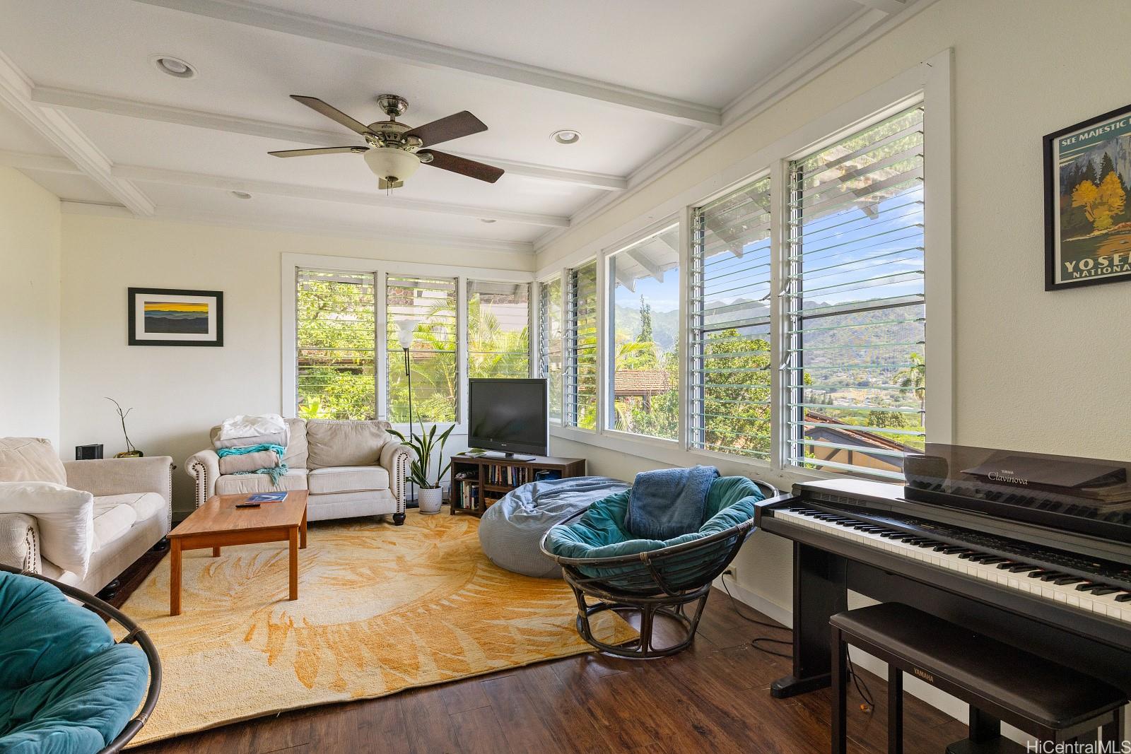 2870 Komaia Place, Unit 2870A AND 2884 Honolulu, HI 96822 - Photo 7 of 25 a living room with furniture and a large window