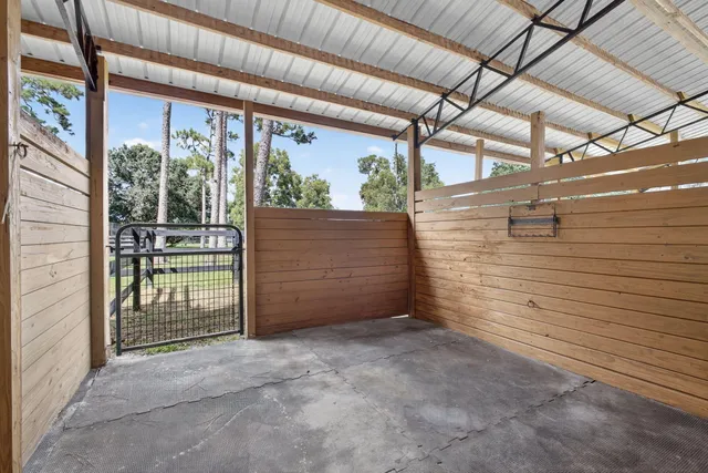 a bathroom with a toilet and a bathtub