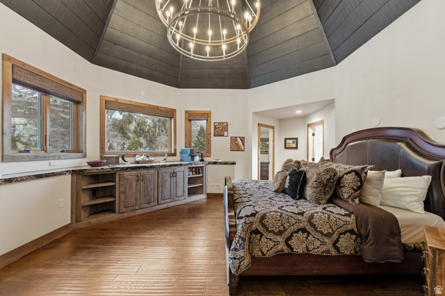 2687 Stewart Road Sundance, UT 84604 - Photo 10 of 48 Bedroom featuring suspended lighting, dark wood finished floors, and vaulted ceiling