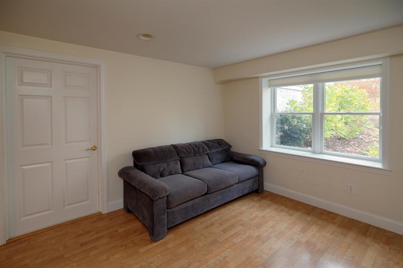 44 Nyes Neck Road Centerville, MA 02632 - Photo 18 of 20 a living room with furniture and a window