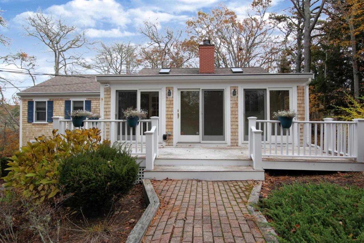 44 Nyes Neck Road Centerville, MA 02632 - Photo 3 of 20 front view of a house with a porch