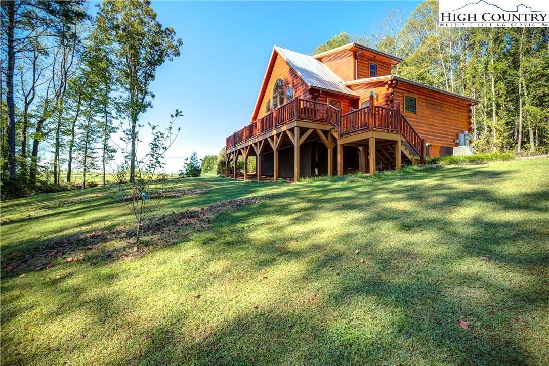 3460 South Center Church Road Thurmond, NC 28683 - Photo 43 of 50 a front view of a house with a yard