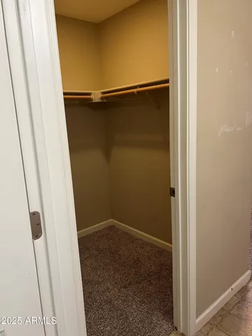 a view of a bathroom with a glass door