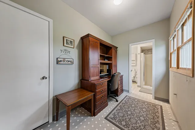 a room with furniture and a rug