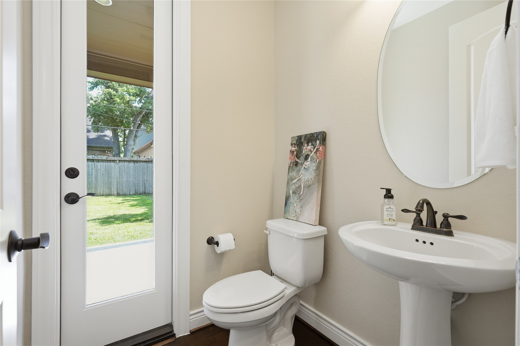 6429 Remlap Street Houston, TX 77055 - Photo 12 of 30 Half bath off the kitchen and backyard access.