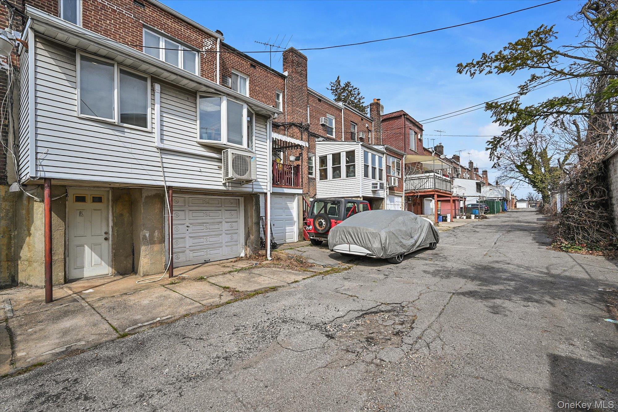 136-54 71st Road Queens, NY 11367 - Photo 24 of 25 a view of a house with a patio