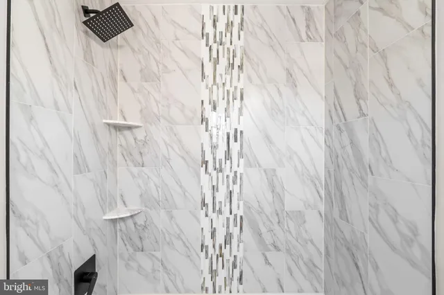 a bathroom with a shower curtain