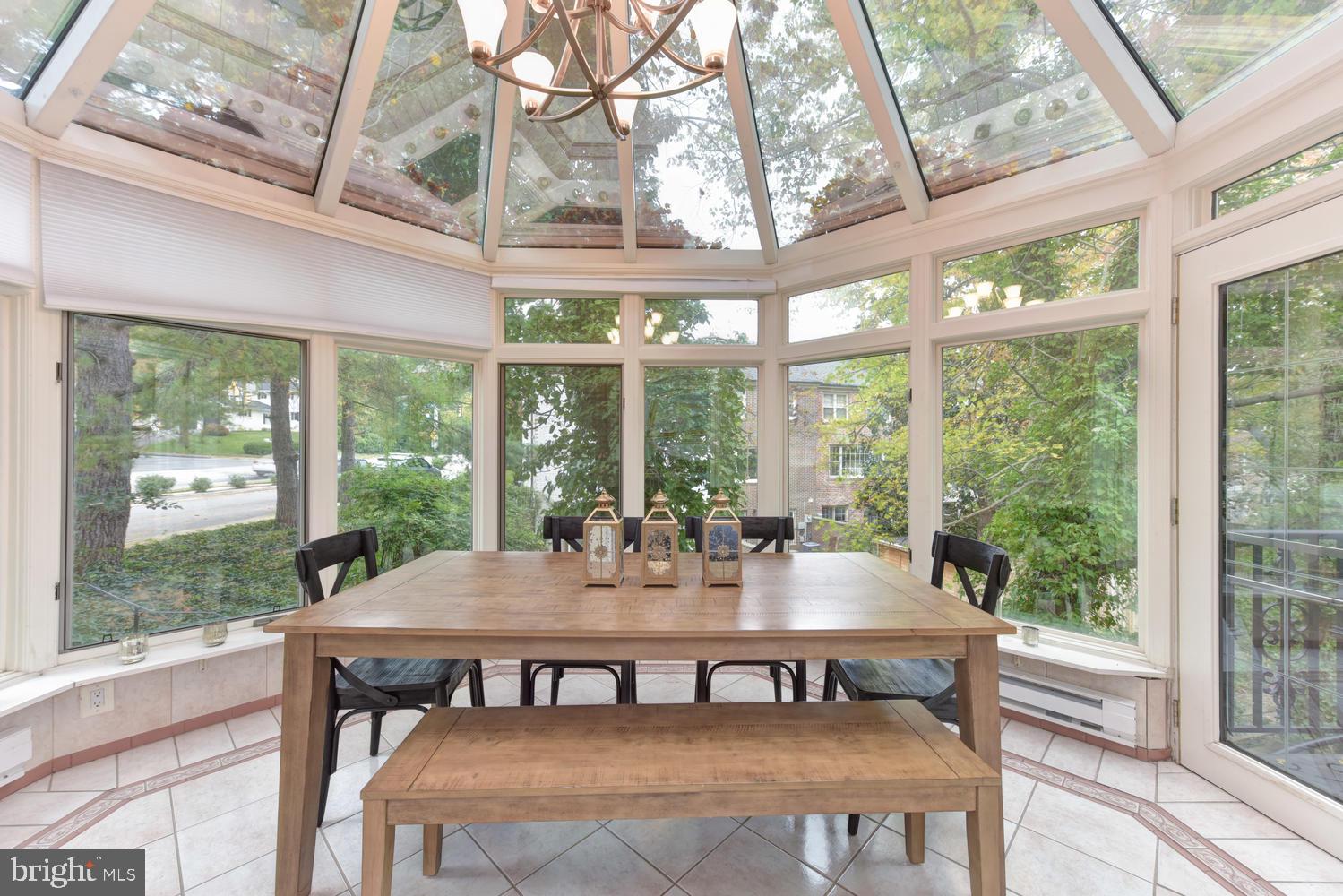 6307 Fort Hunt Road Alexandria, VA 22307 - Photo 14 of 58 Solarium with beautiful treed view