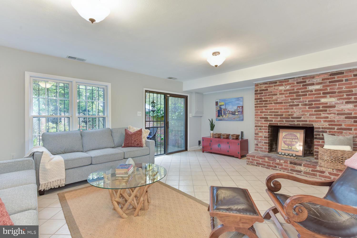 6307 Fort Hunt Road Alexandria, VA 22307 - Photo 31 of 58 Lower level family room w wood burning fireplace