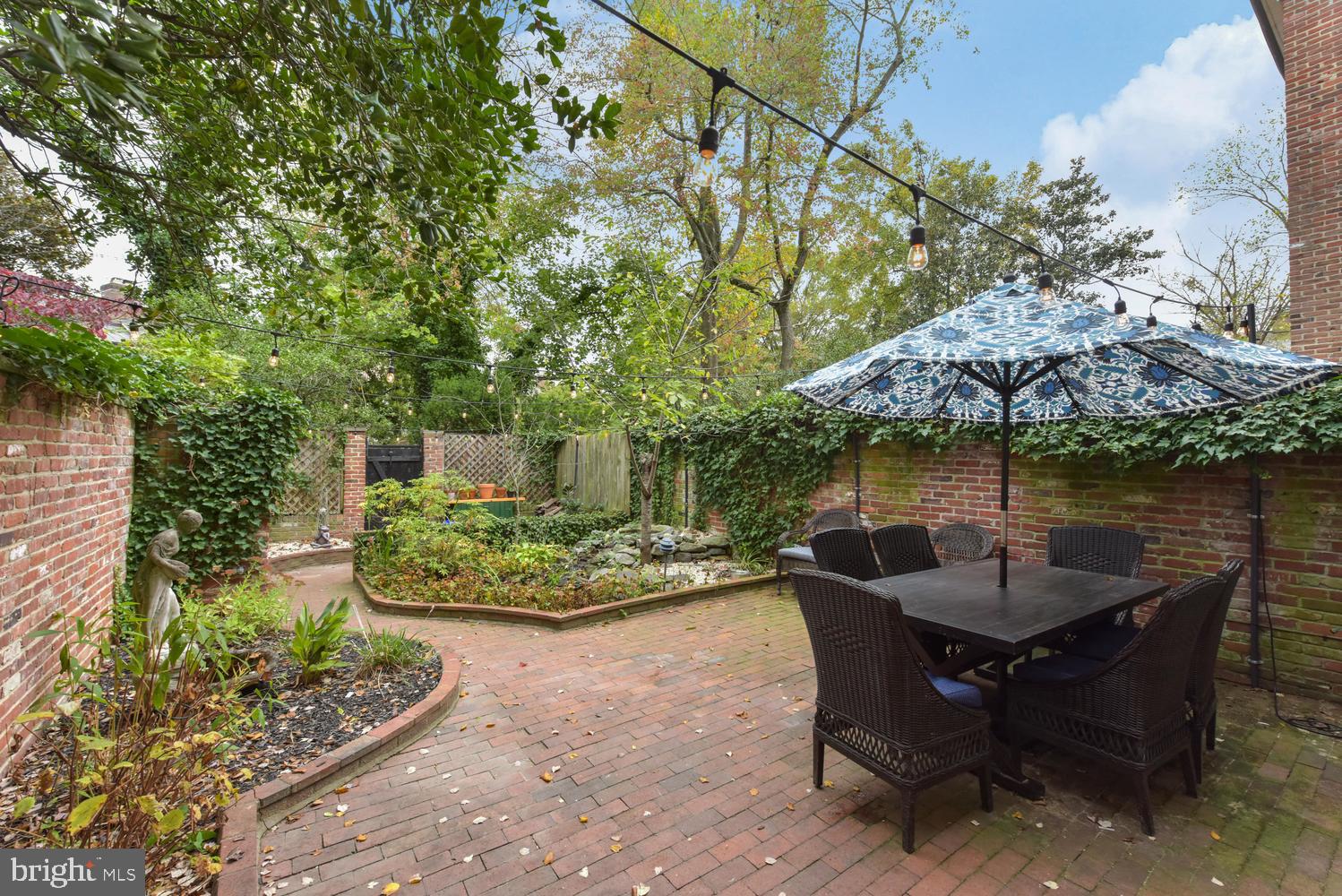 6307 Fort Hunt Road Alexandria, VA 22307 - Photo 41 of 58 Brick patio with koi pond