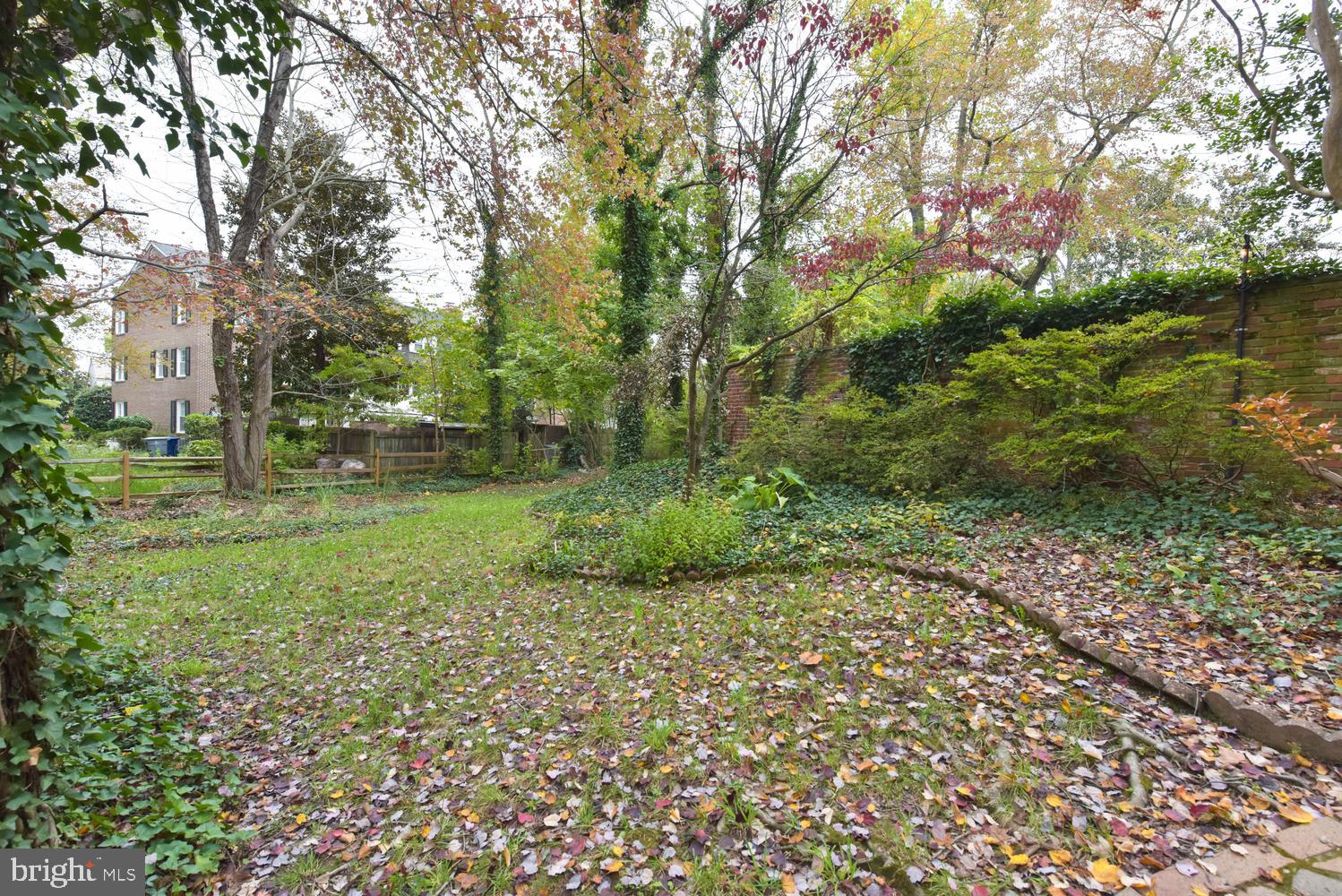 6307 Fort Hunt Road Alexandria, VA 22307 - Photo 48 of 58 Huge yard beyond patio w splitrail fence
