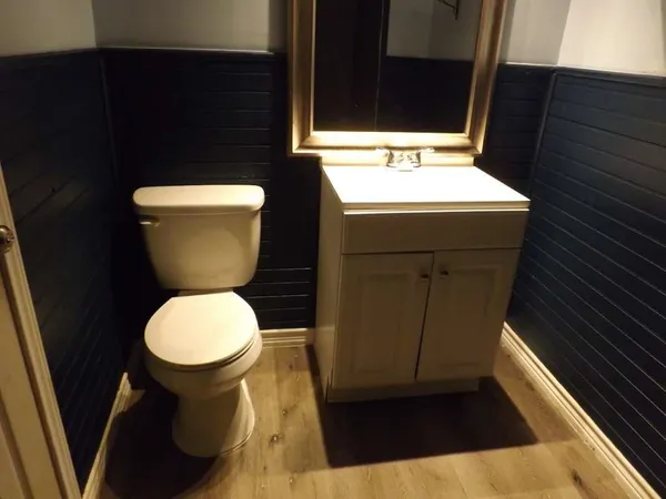 a bathroom with a sink and a toilet