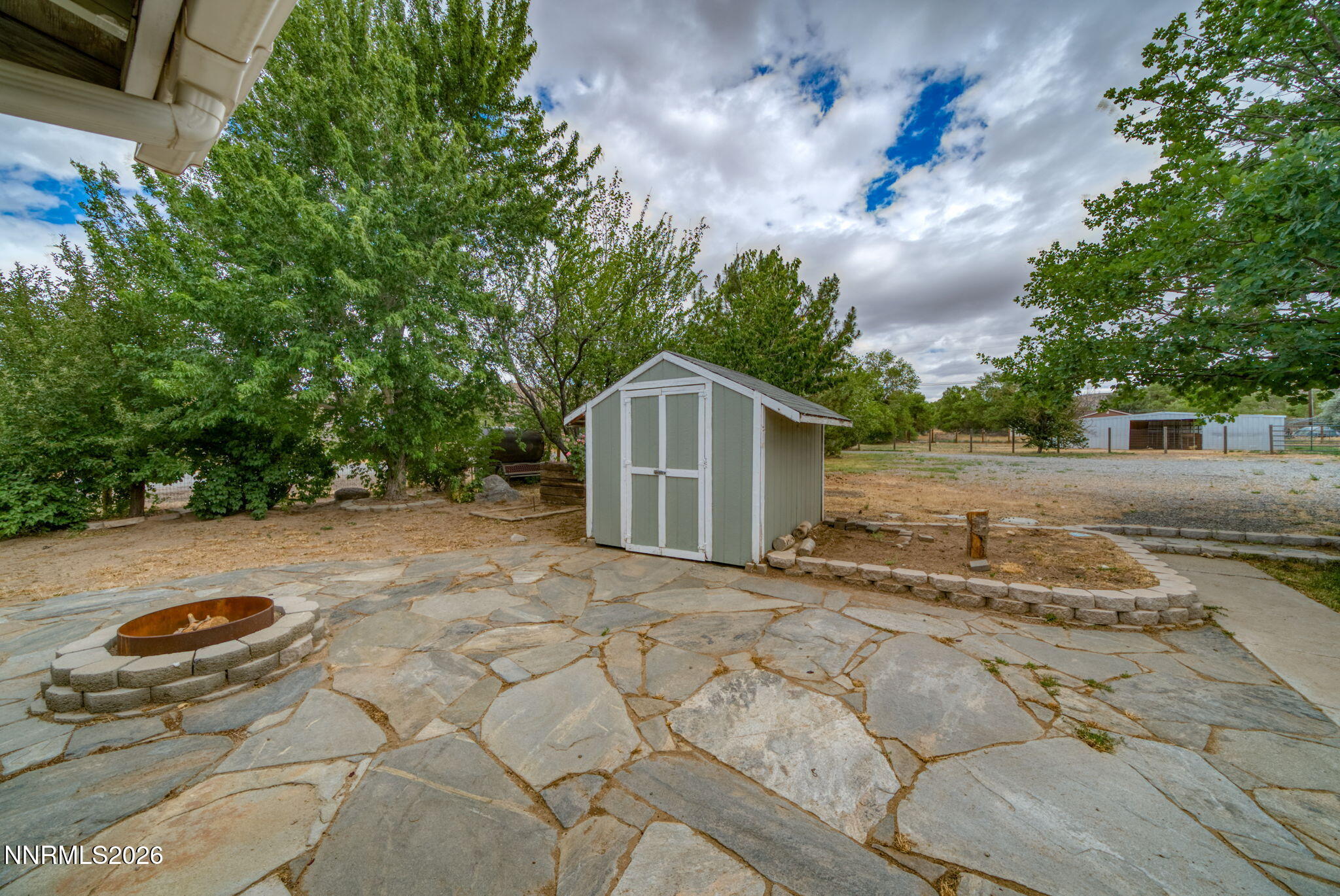 11577 Deodar Way Reno, NV 89506 - Photo 43 of 58 a backyard of a house with lots of green space