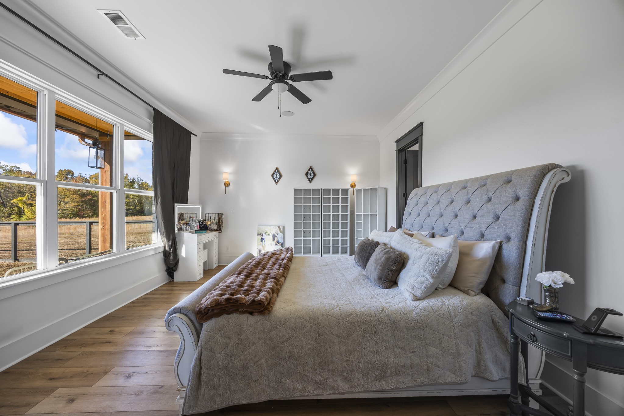 168 Huntersville Denmark Road Denmark, TN 38391 - Photo 22 of 41 a bedroom with a bed and wooden floor