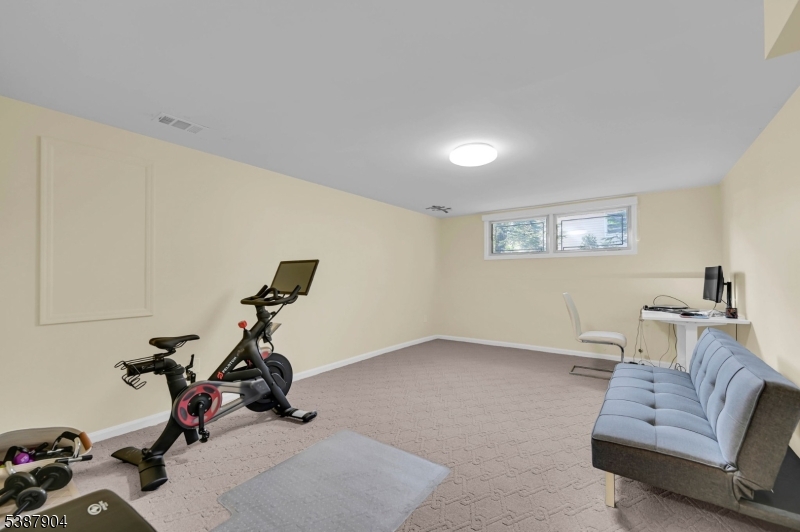 30 County Rte 635 Livingston, NJ 07039 - Photo 22 of 40 a view of a room with gym equipment