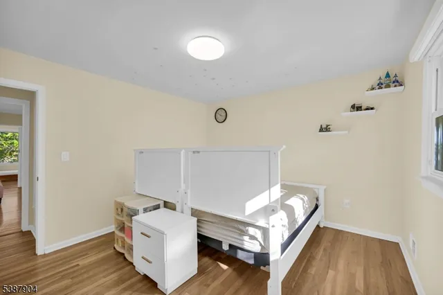 a room with furniture and a wooden floor