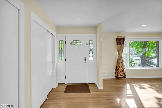 a view of empty room with front door