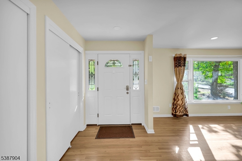 30 County Rte 635 Livingston, NJ 07039 - Photo 3 of 40 a view of empty room with front door