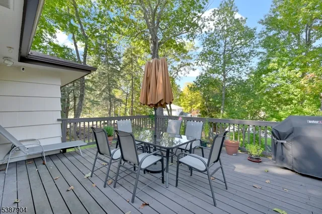a view of a chairs on the roof deck