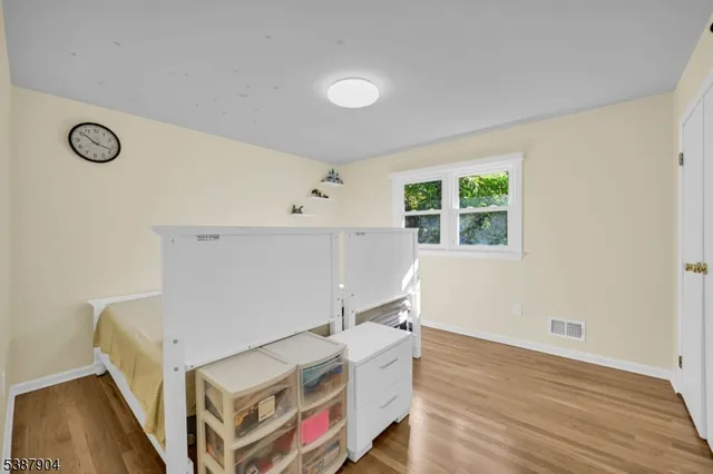a view of livingroom with furniture and wooden floor