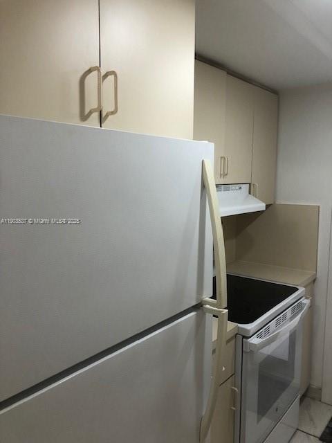 7905 East Drive, Unit 9C North Bay Village, FL 33141 - Photo 7 of 11 a close view of a sink and dishwasher