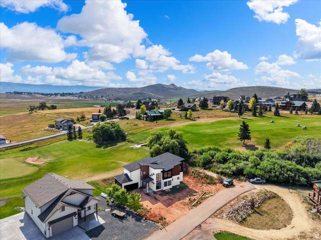 2610 Foxridge Road Garden City, UT 84028 - Photo 11 of 71 View of the home and the proximity to Bear Lake, neighboring homes and 2nd hole at Bear Lake Golf Course