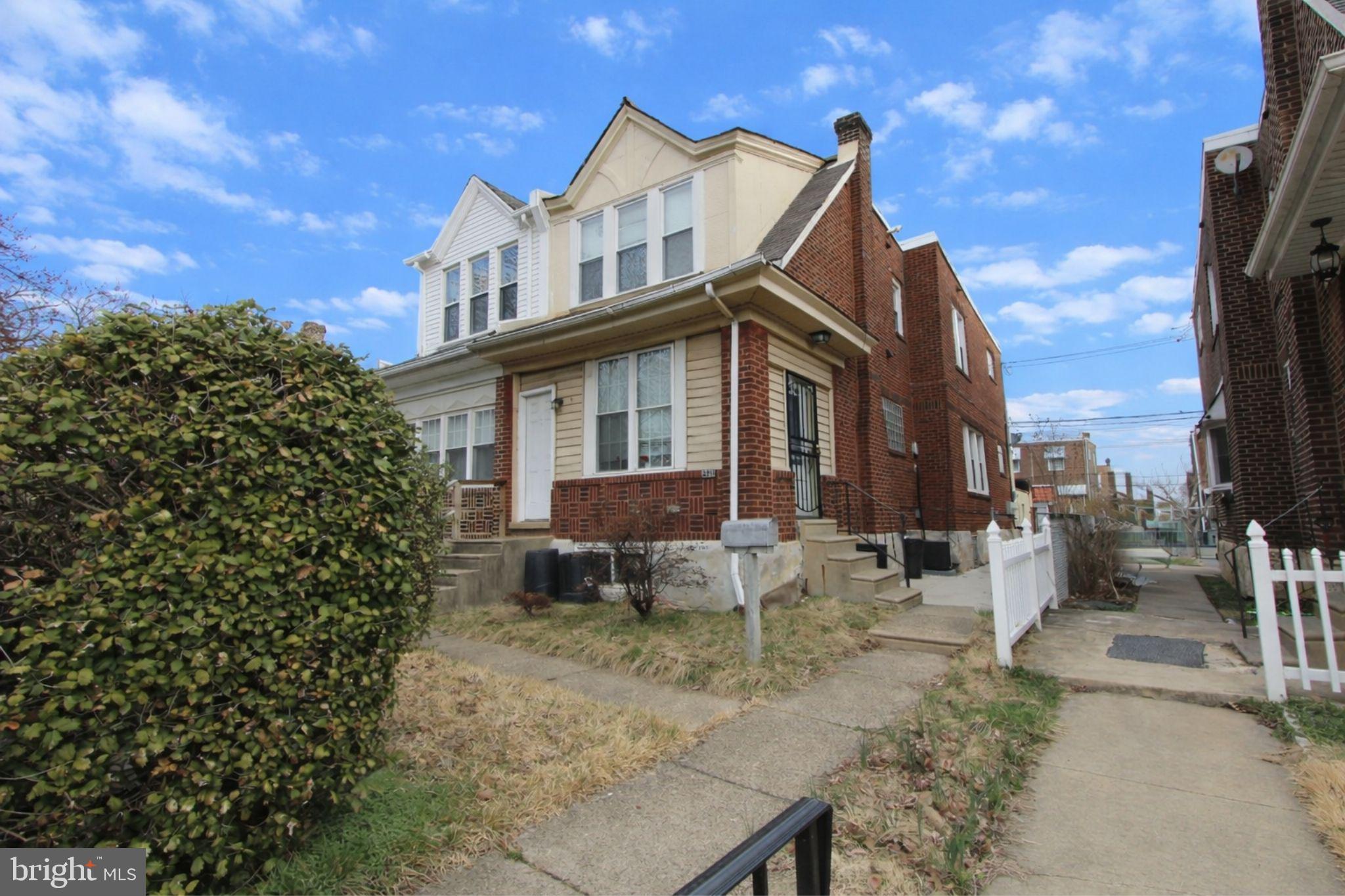 2311 Rhawn Street Philadelphia, PA 19152 - Photo 2 of 34 a view of a house with a yard and sitting area