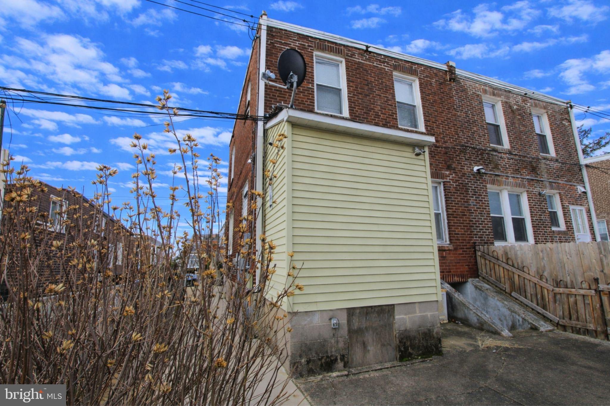 2311 Rhawn Street Philadelphia, PA 19152 - Photo 33 of 34 a front view of a house with a yard