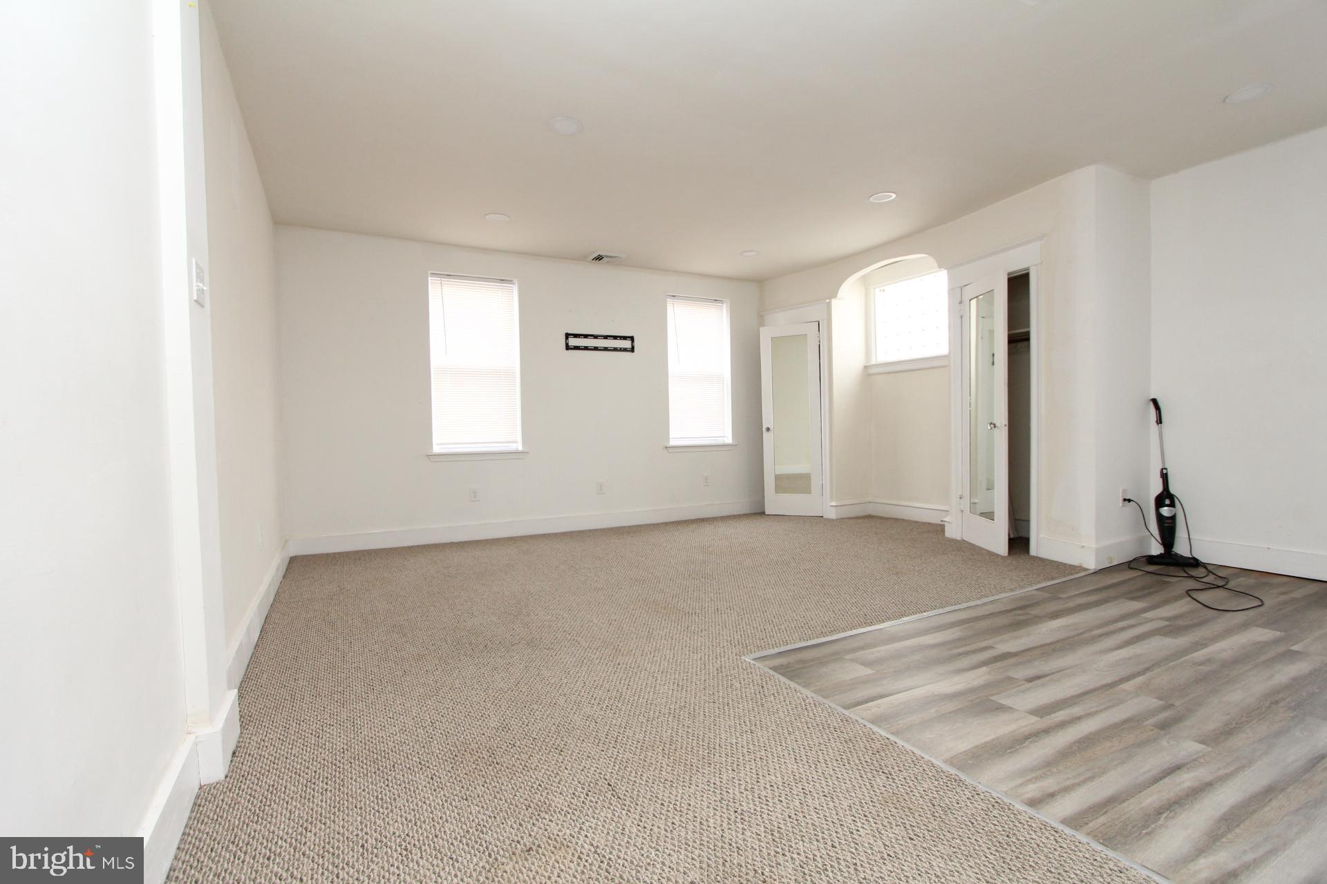 2311 Rhawn Street Philadelphia, PA 19152 - Photo 6 of 34 an empty room with windows and closet