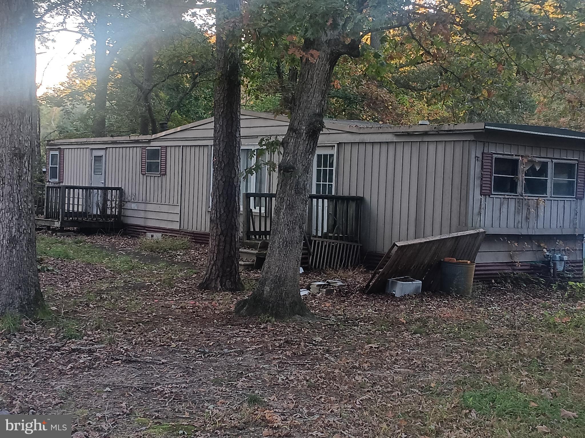 405 Daffodil Road Millville, NJ 08332 - Photo 2 of 10 a backyard of a house with lots of green space