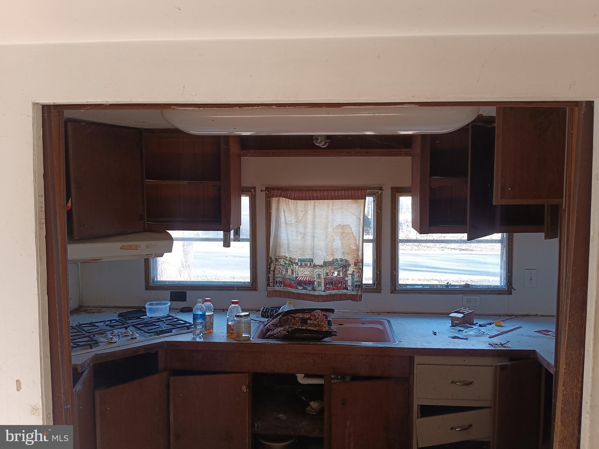 405 Daffodil Road Millville, NJ 08332 - Photo 9 of 10 a bathroom with a sink and a mirror