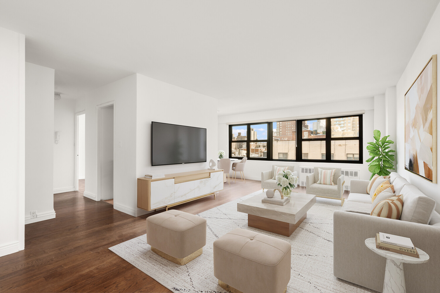 a living room with furniture and a flat screen tv