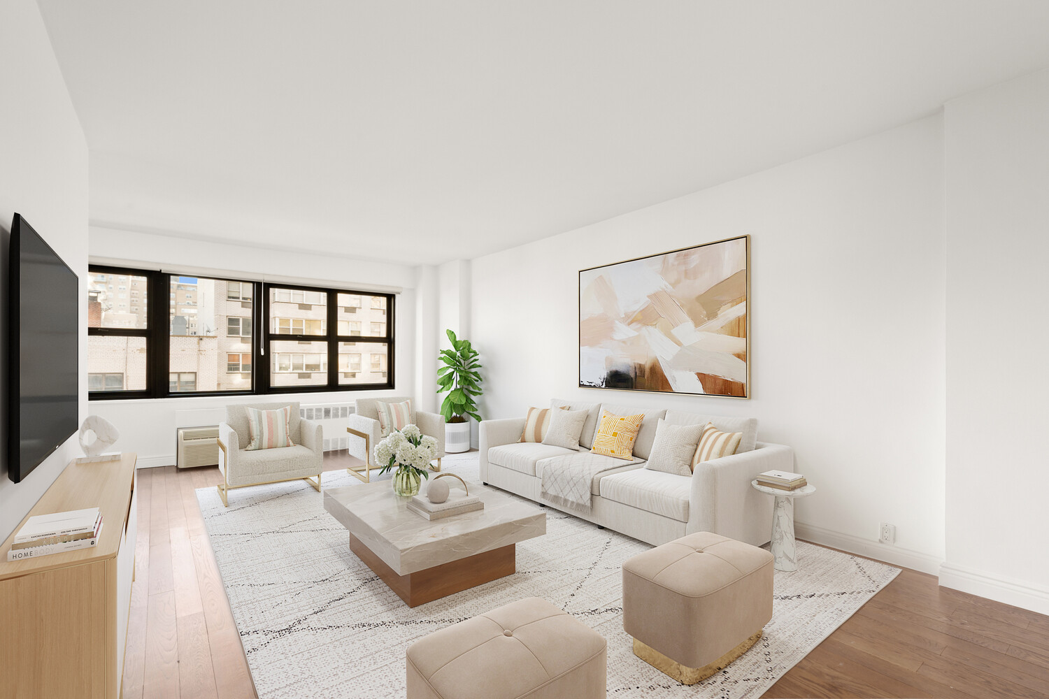 240 East 76th Street, Unit 8G Manhattan, NY 10021 - Photo 2 of 8 a living room with furniture and a large window