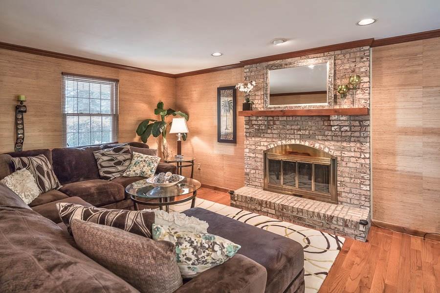 9427 Peebles Road Allison Park, PA 15101 - Photo 14 of 24 Family Room Fireplace and Hardwood Floors