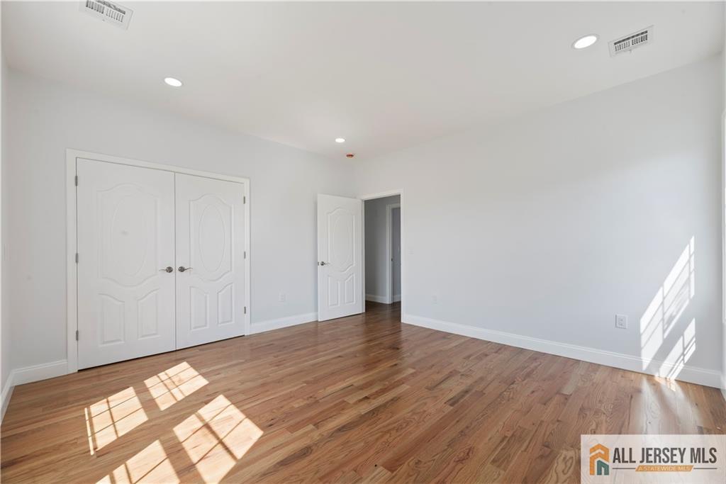 452 Raritan Boulevard Old Bridge, NJ 07735 - Photo 10 of 29 a view of an empty room and a window