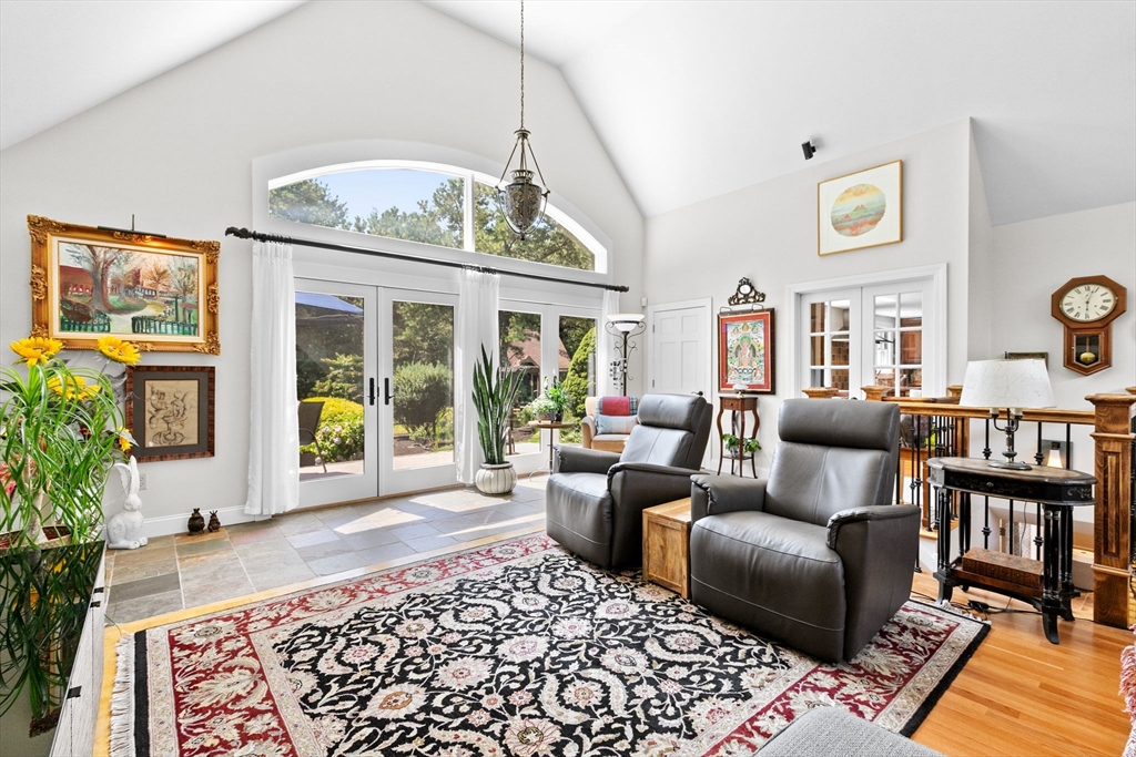 22 Marcus Road Sharon, MA 02067 - Photo 11 of 42 a living room with furniture and a table