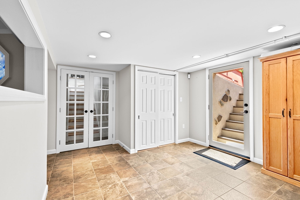 22 Marcus Road Sharon, MA 02067 - Photo 20 of 42 wooden floor in an empty room with a window