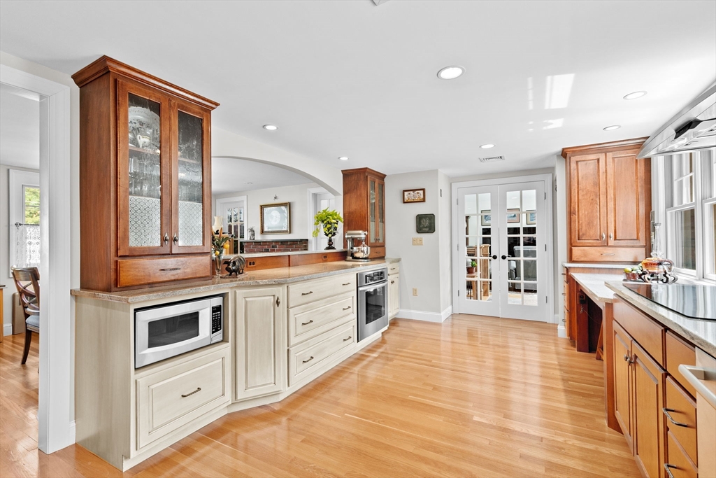 22 Marcus Road Sharon, MA 02067 - Photo 3 of 42 a kitchen with stainless steel appliances granite countertop a stove and a sink