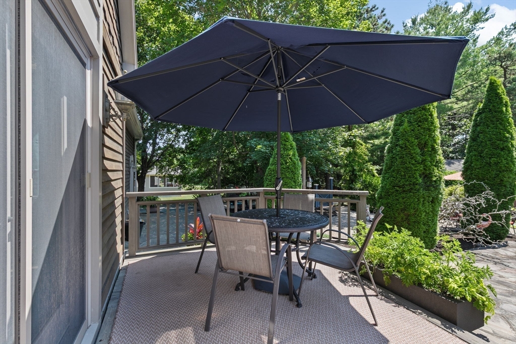 22 Marcus Road Sharon, MA 02067 - Photo 33 of 42 a view of an outdoor sitting area with furniture and backyard