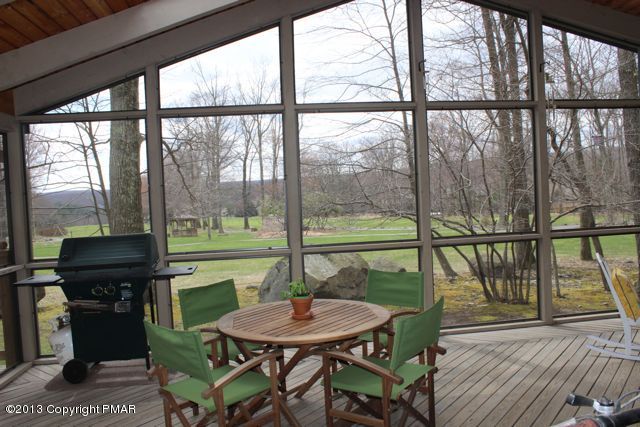 173 Long Road Buck Hill Falls, PA 18323 - Photo 37 of 37 View from the screened porch