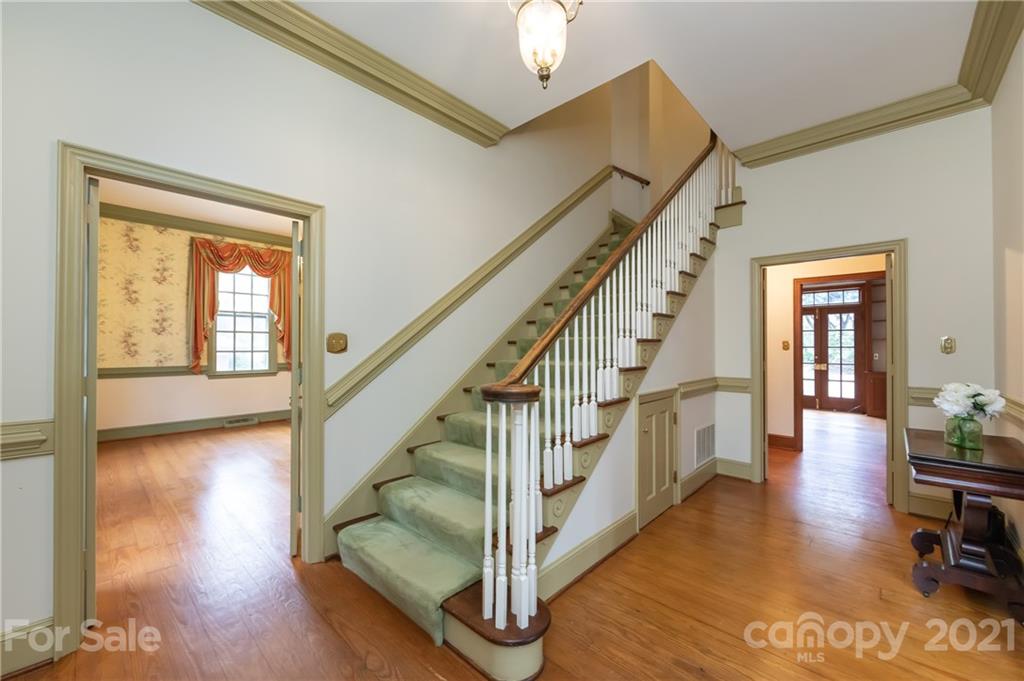3229 Colony Road Charlotte, NC 28211 - Photo 4 of 44 a view of entryway and hall with wooden floor