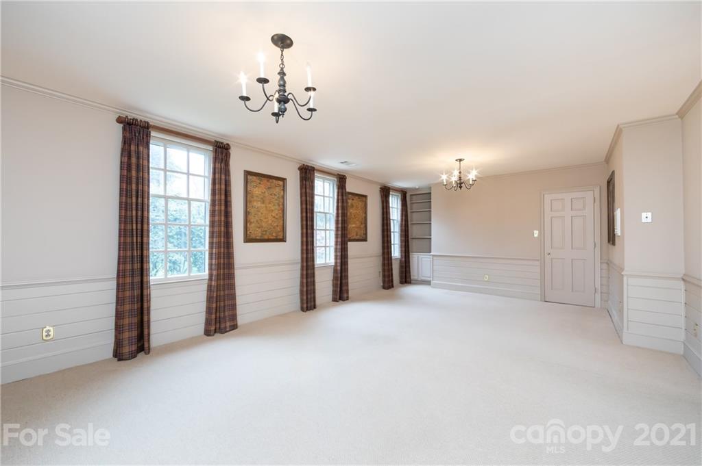 3229 Colony Road Charlotte, NC 28211 - Photo 34 of 44 en empty room with windows and entrance